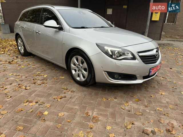 Серый Опель Инсигния, объемом двигателя 1.96 л и пробегом 213 тыс. км за 9900 $, фото 1 на Automoto.ua