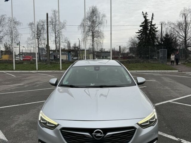 Серый Опель Инсигния, объемом двигателя 2 л и пробегом 213 тыс. км за 14300 $, фото 1 на Automoto.ua