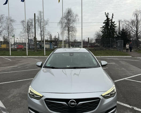 Серый Опель Инсигния, объемом двигателя 2 л и пробегом 213 тыс. км за 14300 $, фото 1 на Automoto.ua