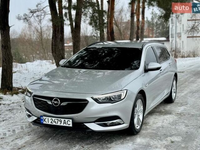 Серый Опель Инсигния, объемом двигателя 2 л и пробегом 207 тыс. км за 13800 $, фото 1 на Automoto.ua