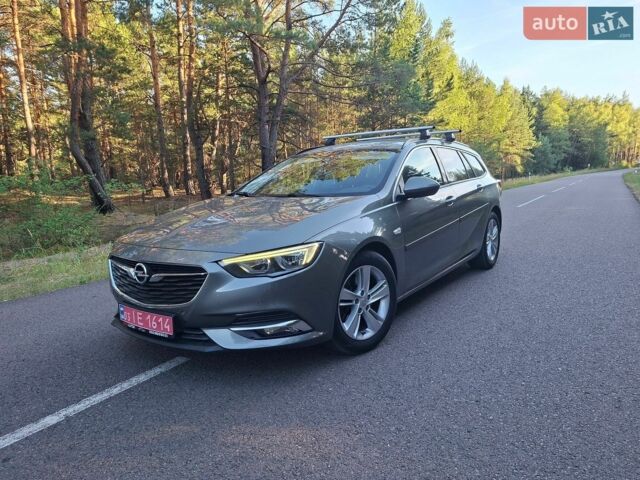 Серый Опель Инсигния, объемом двигателя 2 л и пробегом 169 тыс. км за 13400 $, фото 1 на Automoto.ua
