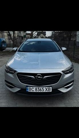 Серый Опель Инсигния, объемом двигателя 2 л и пробегом 238 тыс. км за 15500 $, фото 1 на Automoto.ua