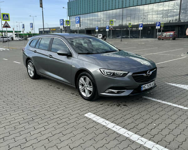 Сірий Опель Інсігнія, об'ємом двигуна 1.96 л та пробігом 160 тис. км за 14900 $, фото 1 на Automoto.ua