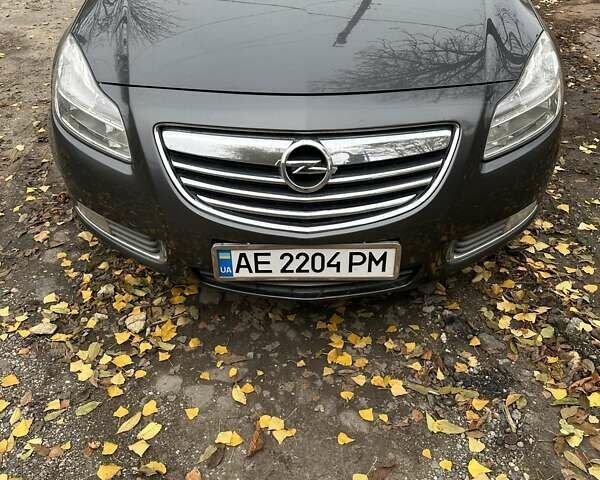 Серый Опель Инсигния, объемом двигателя 2 л и пробегом 246 тыс. км за 7500 $, фото 1 на Automoto.ua