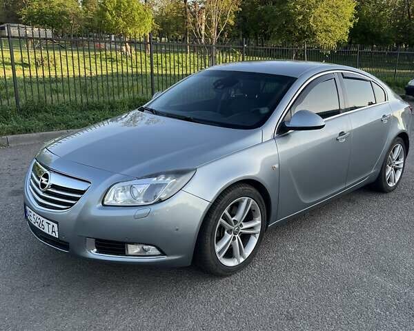 Сірий Опель Інсігнія, об'ємом двигуна 2 л та пробігом 390 тис. км за 7200 $, фото 1 на Automoto.ua