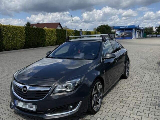 Синий Опель Инсигния, объемом двигателя 2 л и пробегом 185 тыс. км за 15497 $, фото 1 на Automoto.ua