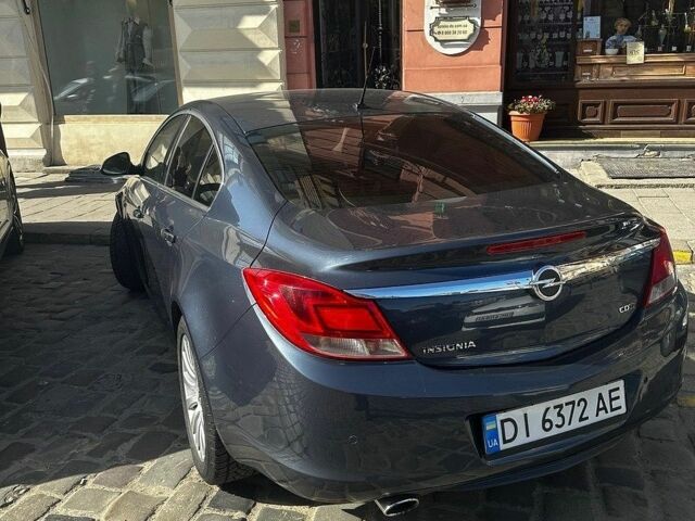 Синій Опель Інсігнія, об'ємом двигуна 1.96 л та пробігом 265 тис. км за 6400 $, фото 1 на Automoto.ua