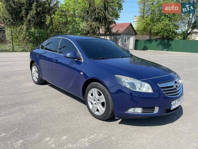 Синий Опель Инсигния, объемом двигателя 2 л и пробегом 255 тыс. км за 7300 $, фото 1 на Automoto.ua