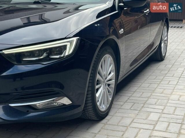 Синий Опель Инсигния, объемом двигателя 1.96 л и пробегом 196 тыс. км за 17000 $, фото 1 на Automoto.ua