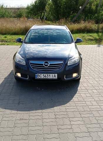 Синий Опель Инсигния, объемом двигателя 1.96 л и пробегом 253 тыс. км за 6299 $, фото 1 на Automoto.ua