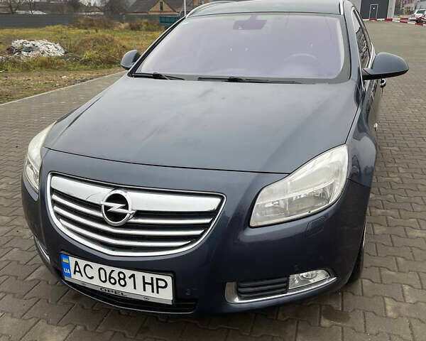 Синий Опель Инсигния, объемом двигателя 1.96 л и пробегом 246 тыс. км за 6650 $, фото 1 на Automoto.ua