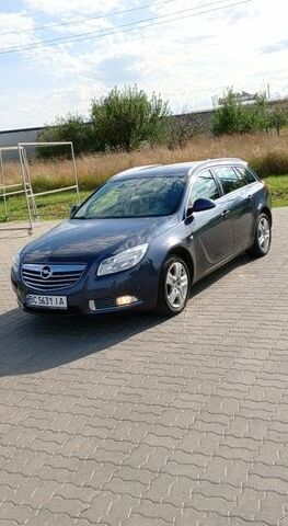 Синій Опель Інсігнія, об'ємом двигуна 1.96 л та пробігом 257 тис. км за 5250 $, фото 1 на Automoto.ua