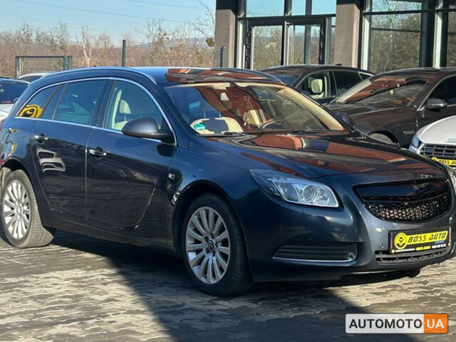 Синий Опель Инсигния, объемом двигателя 2 л и пробегом 240 тыс. км за 9800 $, фото 1 на Automoto.ua