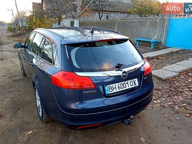 Синий Опель Инсигния, объемом двигателя 2 л и пробегом 374 тыс. км за 7600 $, фото 1 на Automoto.ua