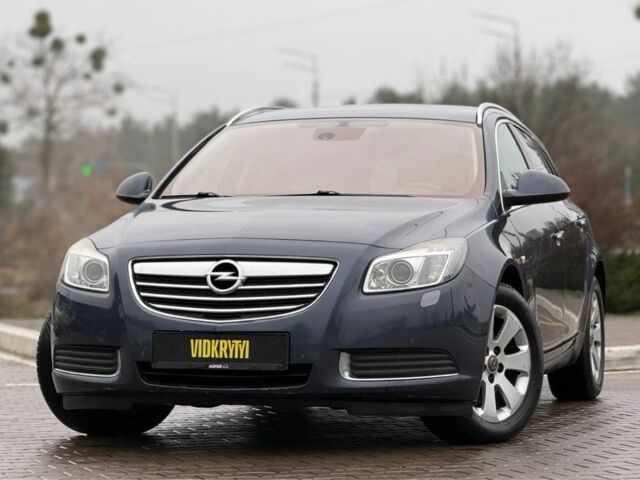 Синий Опель Инсигния, объемом двигателя 2 л и пробегом 306 тыс. км за 6800 $, фото 1 на Automoto.ua