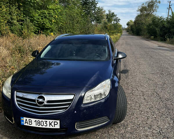 Синий Опель Инсигния, объемом двигателя 2 л и пробегом 256 тыс. км за 5800 $, фото 1 на Automoto.ua