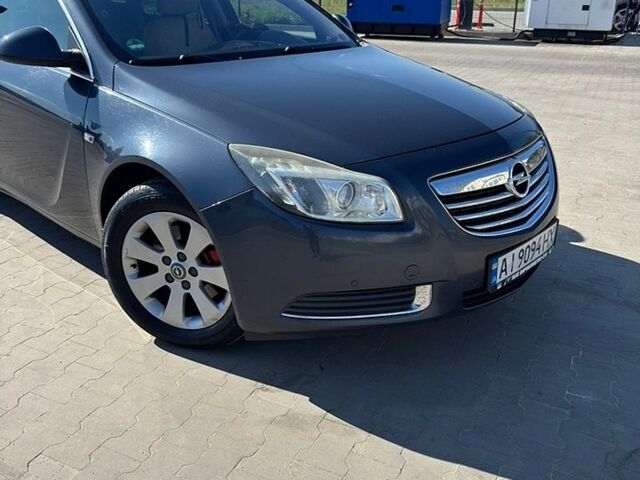 Синий Опель Инсигния, объемом двигателя 1.96 л и пробегом 268 тыс. км за 7300 $, фото 1 на Automoto.ua