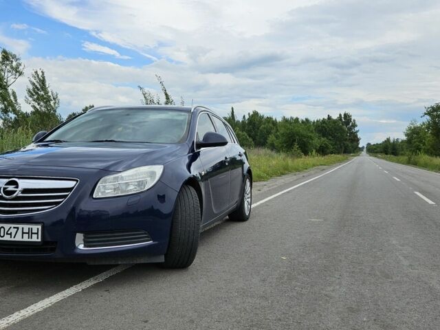 Синий Опель Инсигния, объемом двигателя 2 л и пробегом 335 тыс. км за 6500 $, фото 1 на Automoto.ua