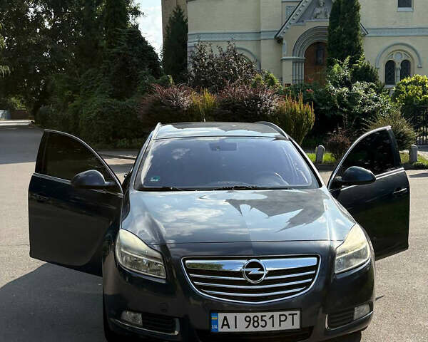 Синий Опель Инсигния, объемом двигателя 1.96 л и пробегом 312 тыс. км за 7500 $, фото 1 на Automoto.ua