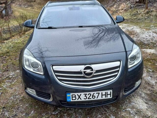 Синий Опель Инсигния, объемом двигателя 2 л и пробегом 151 тыс. км за 8500 $, фото 1 на Automoto.ua