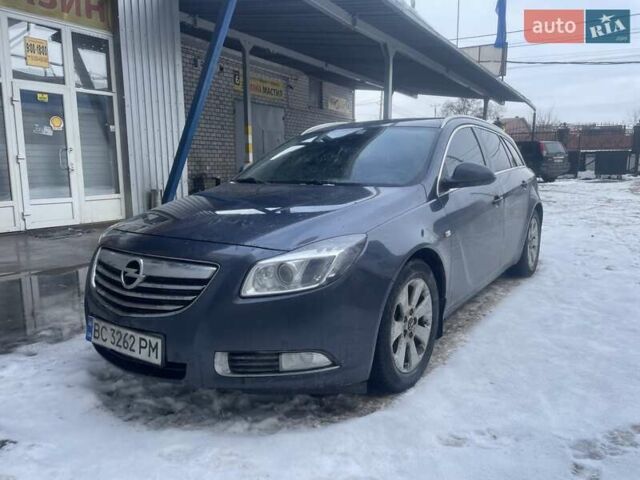 Синий Опель Инсигния, объемом двигателя 2 л и пробегом 320 тыс. км за 3600 $, фото 1 на Automoto.ua