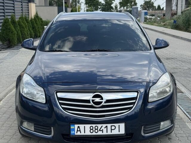 Синий Опель Инсигния, объемом двигателя 2 л и пробегом 351 тыс. км за 6800 $, фото 1 на Automoto.ua