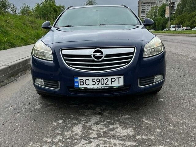 Синий Опель Инсигния, объемом двигателя 1.96 л и пробегом 250 тыс. км за 7700 $, фото 1 на Automoto.ua