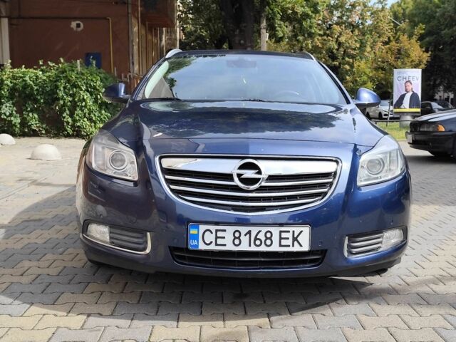 Синий Опель Инсигния, объемом двигателя 2 л и пробегом 212 тыс. км за 8500 $, фото 1 на Automoto.ua