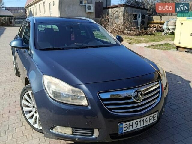 Синий Опель Инсигния, объемом двигателя 2 л и пробегом 230 тыс. км за 6400 $, фото 1 на Automoto.ua