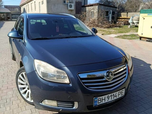 Синий Опель Инсигния, объемом двигателя 2 л и пробегом 230 тыс. км за 7300 $, фото 1 на Automoto.ua