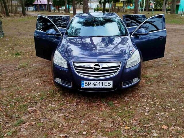 Синий Опель Инсигния, объемом двигателя 2 л и пробегом 303 тыс. км за 7700 $, фото 1 на Automoto.ua