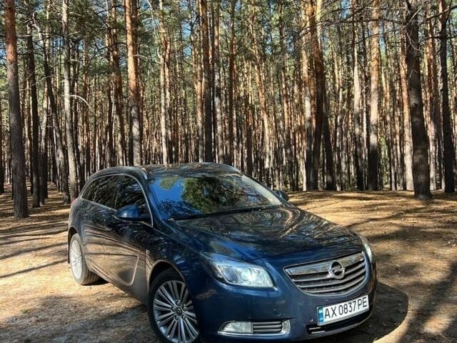 Синій Опель Інсігнія, об'ємом двигуна 2 л та пробігом 200 тис. км за 6709 $, фото 1 на Automoto.ua