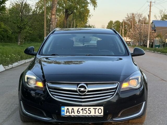 Синий Опель Инсигния, объемом двигателя 2 л и пробегом 319 тыс. км за 8500 $, фото 1 на Automoto.ua