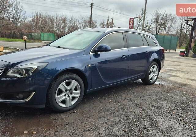 Синий Опель Инсигния, объемом двигателя 1.96 л и пробегом 226 тыс. км за 9300 $, фото 1 на Automoto.ua