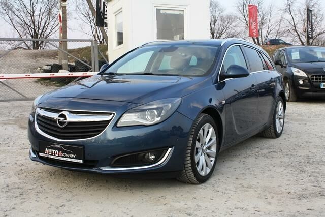 Синий Опель Инсигния, объемом двигателя 2 л и пробегом 174 тыс. км за 12450 $, фото 1 на Automoto.ua