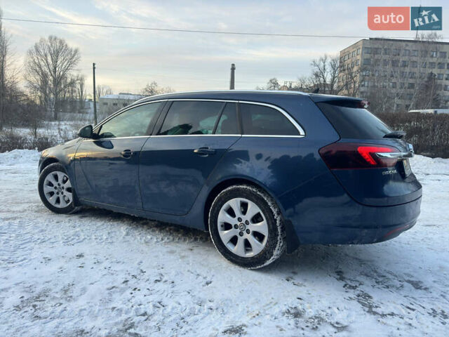 Синий Опель Инсигния, объемом двигателя 2 л и пробегом 205 тыс. км за 11000 $, фото 1 на Automoto.ua