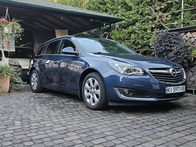 Синій Опель Інсігнія, об'ємом двигуна 2 л та пробігом 105 тис. км за 13999 $, фото 1 на Automoto.ua