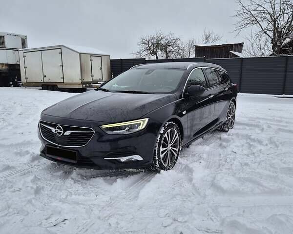 Синій Опель Інсігнія, об'ємом двигуна 2 л та пробігом 201 тис. км за 16599 $, фото 1 на Automoto.ua