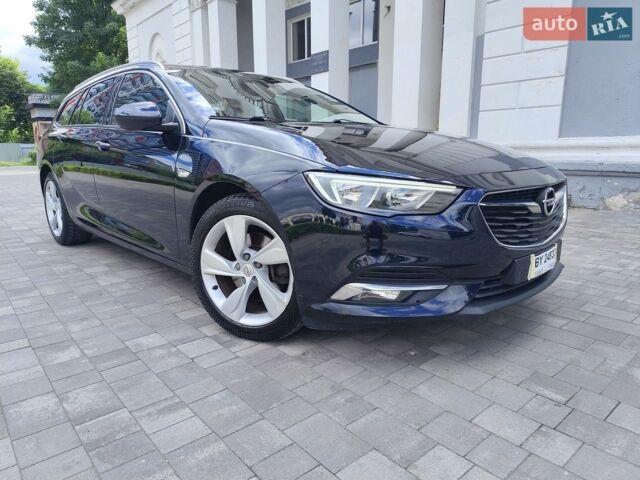 Синий Опель Инсигния, объемом двигателя 2 л и пробегом 297 тыс. км за 12399 $, фото 1 на Automoto.ua