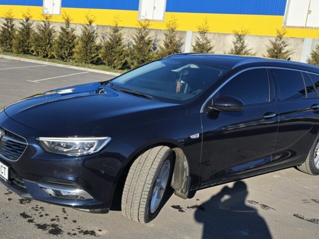 Синий Опель Инсигния, объемом двигателя 2 л и пробегом 189 тыс. км за 17000 $, фото 1 на Automoto.ua