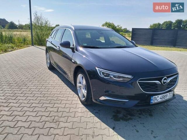 Синий Опель Инсигния, объемом двигателя 2 л и пробегом 239 тыс. км за 13900 $, фото 1 на Automoto.ua