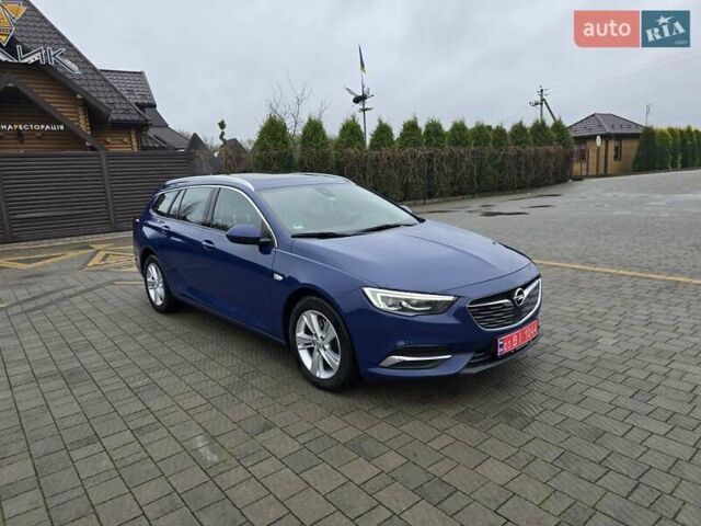 Синий Опель Инсигния, объемом двигателя 2 л и пробегом 240 тыс. км за 14900 $, фото 1 на Automoto.ua