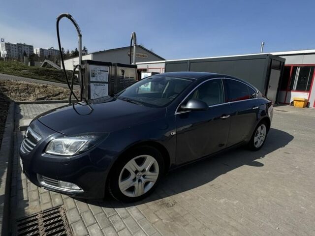 Синій Опель Інсігнія, об'ємом двигуна 2 л та пробігом 298 тис. км за 7612 $, фото 1 на Automoto.ua
