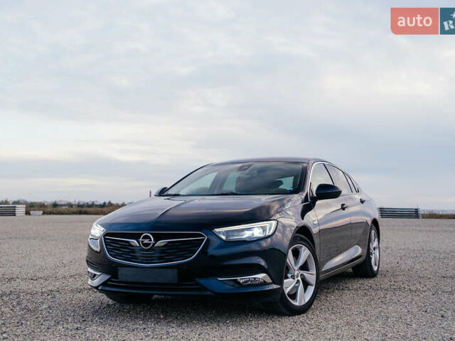 Синій Опель Інсігнія, об'ємом двигуна 2 л та пробігом 242 тис. км за 16500 $, фото 1 на Automoto.ua