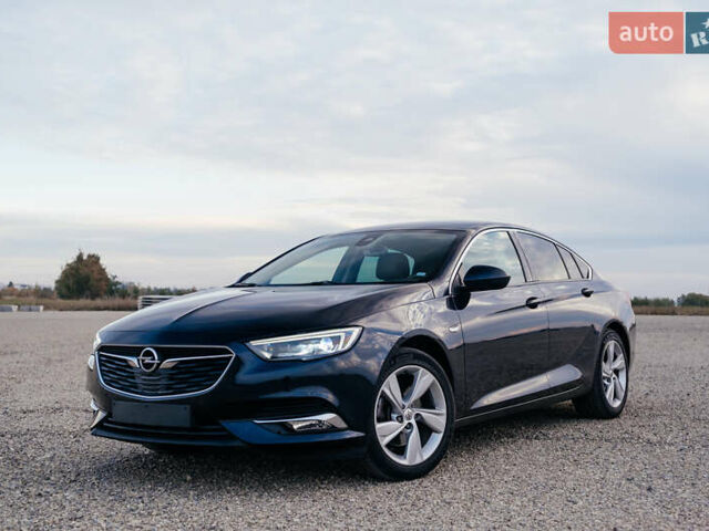 Синій Опель Інсігнія, об'ємом двигуна 2 л та пробігом 200 тис. км за 16500 $, фото 1 на Automoto.ua