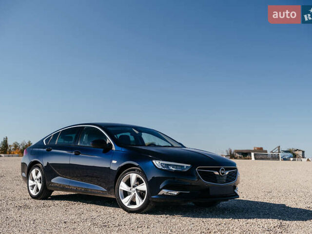 Синий Опель Инсигния, объемом двигателя 2 л и пробегом 242 тыс. км за 16500 $, фото 1 на Automoto.ua