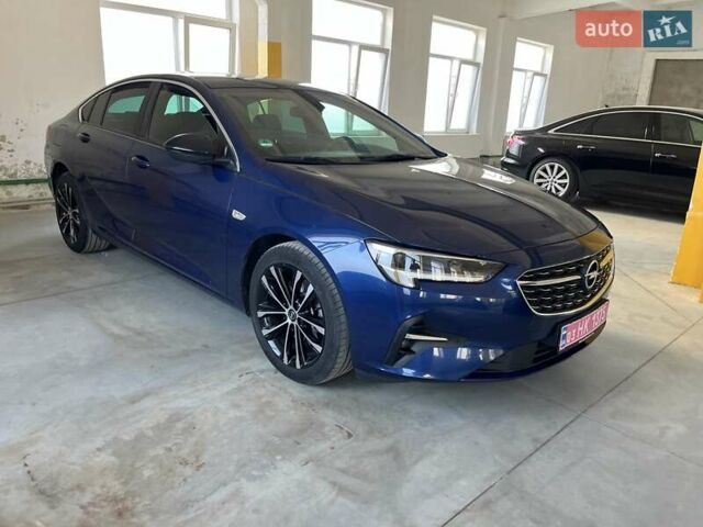Синий Опель Инсигния, объемом двигателя 2 л и пробегом 119 тыс. км за 18900 $, фото 1 на Automoto.ua