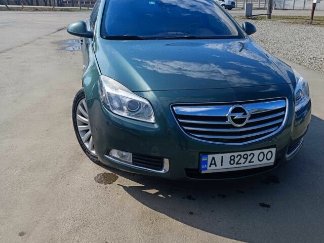 Зеленый Опель Инсигния, объемом двигателя 2 л и пробегом 235 тыс. км за 8000 $, фото 1 на Automoto.ua