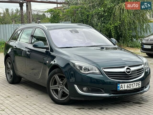 Зелений Опель Інсігнія, об'ємом двигуна 1.96 л та пробігом 257 тис. км за 10799 $, фото 1 на Automoto.ua