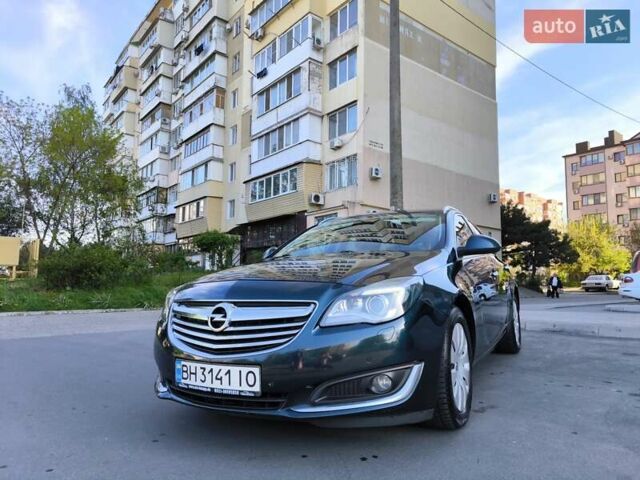 Зелений Опель Інсігнія, об'ємом двигуна 1.96 л та пробігом 273 тис. км за 11500 $, фото 1 на Automoto.ua